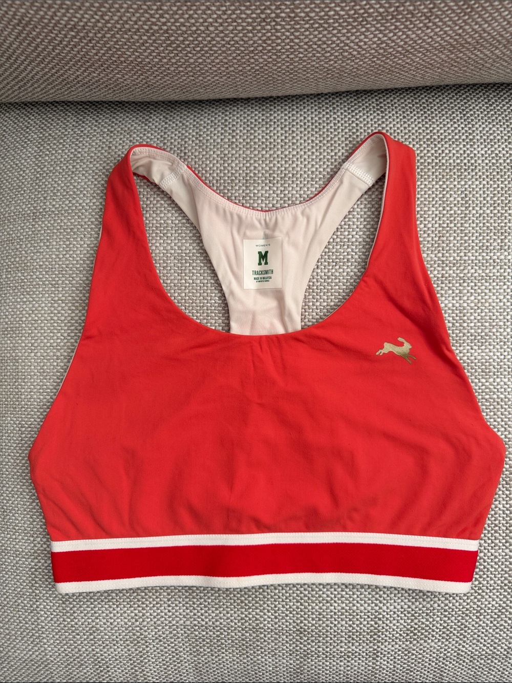 Tracksmith Orange-Red Sports Bra with White Trim